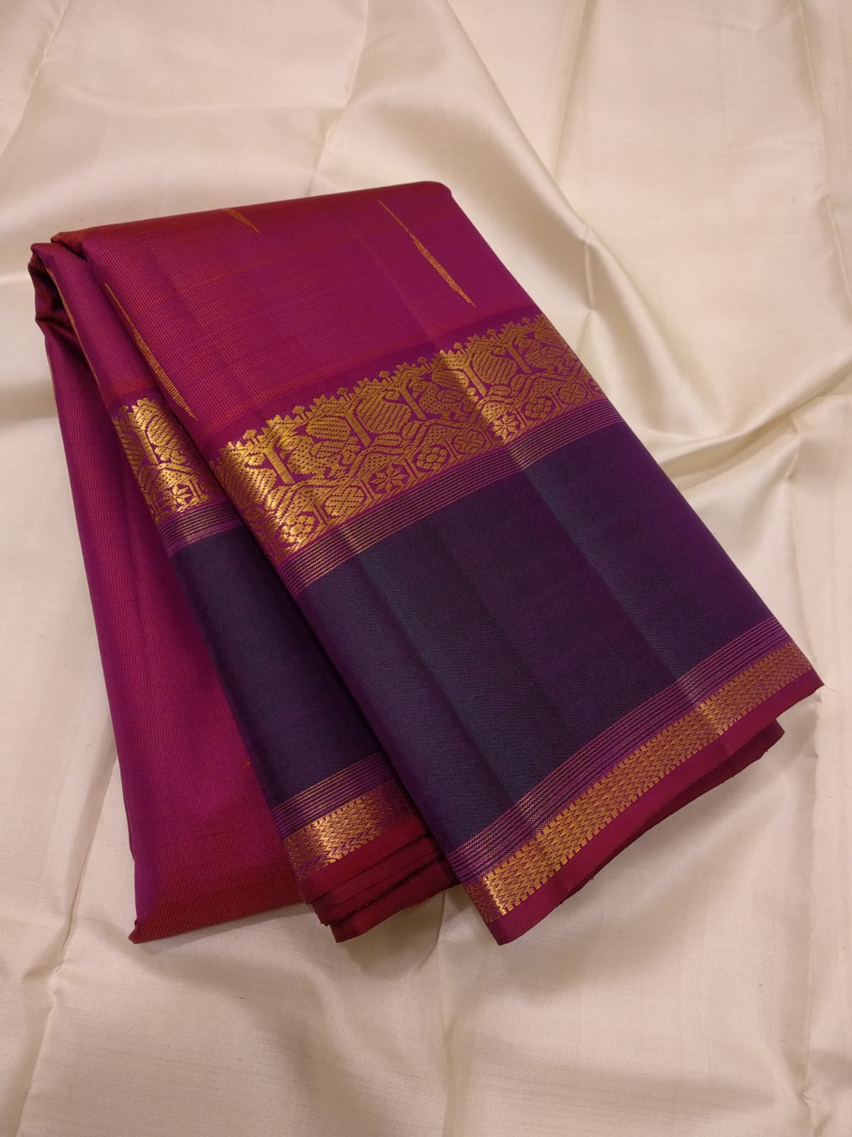 Handloom Kanchipuram Silk Saree with a Korvai border.